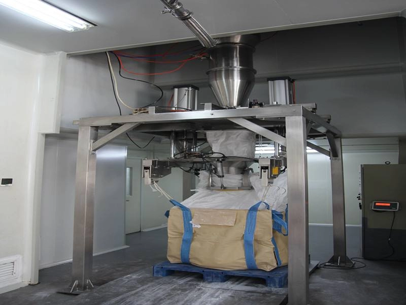 Automatische verpakkingseenheid voor tonzakken (korrelig en poederachtig materiaal)