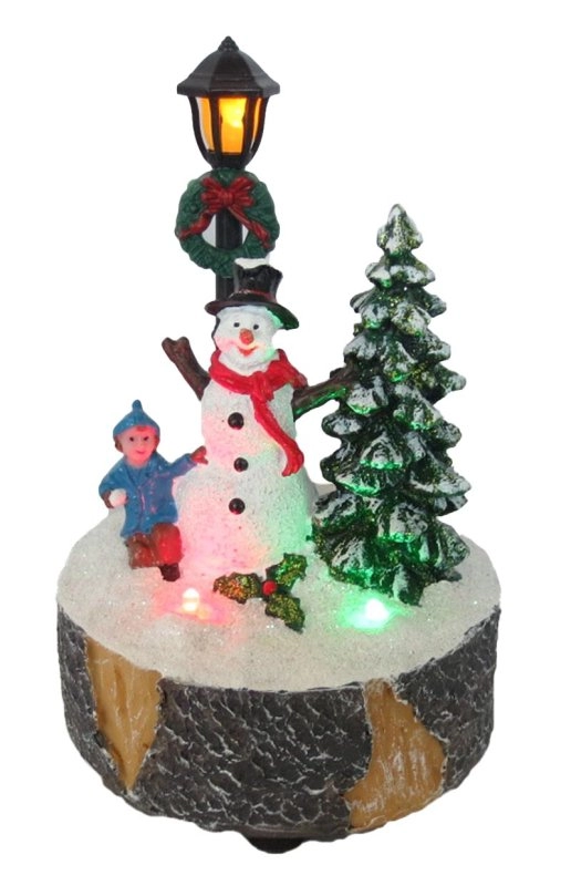 Verlicht kerstgebouw Sneeuwpop, sneeuwballengevecht en korendorp
