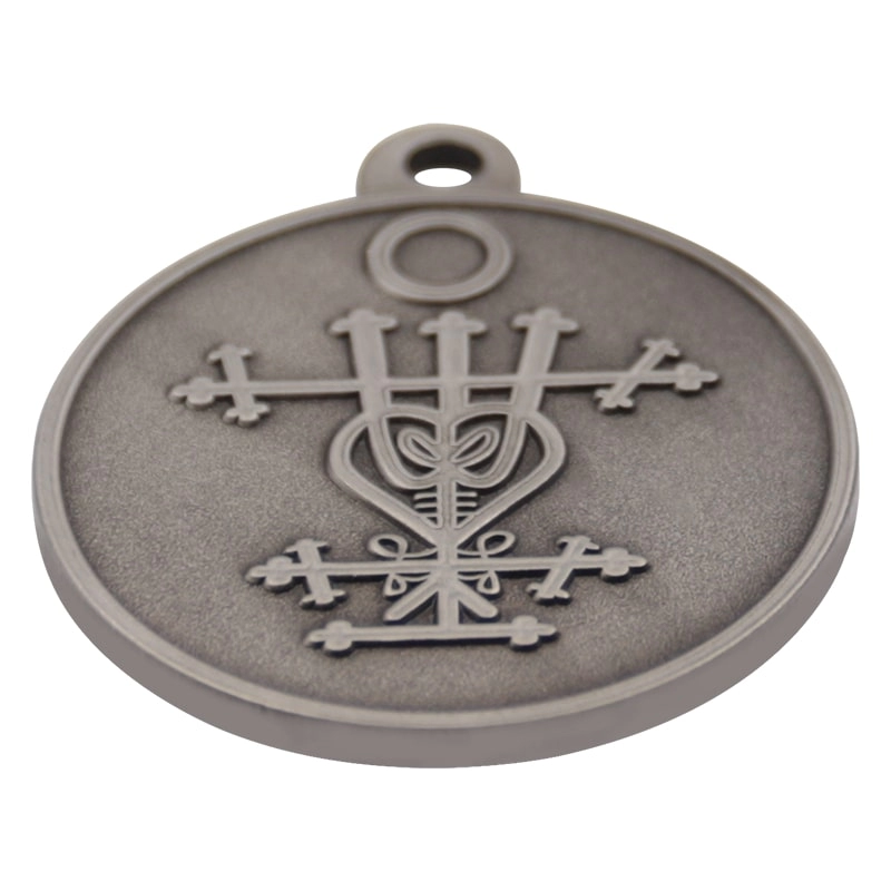 Leverancier op maat zandstraal oude zilveren religieuze medailles